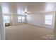 Large bedroom with neutral walls and carpet at 2138 Durand Rd, Fort Mill, SC 29715