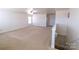 Spacious bonus room with carpeted floors and ceiling fan at 2138 Durand Rd, Fort Mill, SC 29715