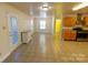 Open dining area with tile floors and access to kitchen and backyard at 2138 Durand Rd, Fort Mill, SC 29715
