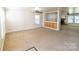 Open living room featuring a fireplace and built-in shelving at 2138 Durand Rd, Fort Mill, SC 29715