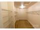 Large walk-in closet with wire shelving for storage at 2138 Durand Rd, Fort Mill, SC 29715