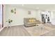 Living room with recliner sofa and kitchen view at 2407 Autumn Olive Ln, Stallings, NC 28104