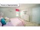 Bedroom with full-size bed and rainbow decor at 3524 Hackberry Dr, Gastonia, NC 28056