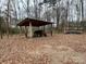 Wooden shelter for storing equipment at 4024 Stack Rd, Monroe, NC 28112