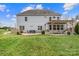 Two story house with backyard patio and pergola at 5314 Auburn Hill Ln, Charlotte, NC 28269