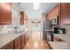 Modern kitchen with stainless steel appliances and ample cabinetry at 5315 Hackberry Sw Ln, Concord, NC 28027