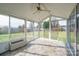 Bright sunroom with stone flooring, sliding glass doors, and AC unit at 5315 Hackberry Sw Ln, Concord, NC 28027