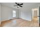 Hardwood floor bedroom with ceiling fan and access to hallway at 605 Ferndale Dr, Rock Hill, SC 29730