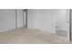 Spacious bedroom with carpet and en-suite bath at 800 Peachtree Rd, Charlotte, NC 28216
