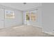 Bedroom with carpet and large windows at 800 Peachtree Rd, Charlotte, NC 28216