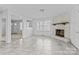 Living room with fireplace and tile flooring at 800 Peachtree Rd, Charlotte, NC 28216