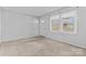 Bright living room with neutral carpeting at 800 Peachtree Rd, Charlotte, NC 28216