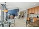 Kitchen with built-in desk and open view to the Gathering room and staircase at 9302 Brown Gelly Dr, Huntersville, NC 28078