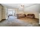 Spacious bonus room with two couches and access to a smaller room at 952 Hummingbird Ln, Rock Hill, SC 29732