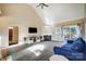 Spacious living room with fireplace and access to deck at 952 Hummingbird Ln, Rock Hill, SC 29732