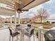 Lakefront balcony with patio furniture and grill at 18015 Kings Point Dr # F, Cornelius, NC 28031