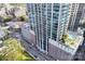 Aerial view of a high rise building with rooftop pool at 210 N Church St # 1213, Charlotte, NC 28202