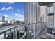 Spacious balcony overlooking the city skyline at 210 N Church St # 1213, Charlotte, NC 28202