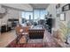 Spacious living room featuring hardwood floors and city views at 210 N Church St # 1213, Charlotte, NC 28202