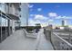 Relaxing rooftop patio with city views at 210 N Church St # 1213, Charlotte, NC 28202