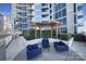 Outdoor patio with seating area and pergola at 210 N Church St # 1213, Charlotte, NC 28202