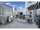 Relaxing rooftop terrace with grilling station, fireplace, and seating area at 210 N Church St # 1213, Charlotte, NC 28202