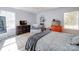 Main bedroom with gray upholstered bed and tranquil decor at 2151 Pacer Rd, Lancaster, SC 29720