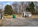 Backyard view with shed and garbage cans at 2710 Tallu Rd, Charlotte, NC 28269