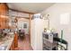 Open kitchen with views into the dining area and refrigerator at 2710 Tallu Rd, Charlotte, NC 28269