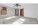 Bedroom with exposed brick wall, new flooring and ceiling fan at 3753 Asbury Church Rd, Lincolnton, NC 28092