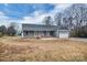 Gray house with a white garage door and front porch at 405 Stony Point Rd, Kings Mountain, NC 28086