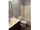 Clean bathroom with tub/shower combo and vanity at 104 Lassiter Ct, Mount Holly, NC 28120