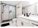 Modern bathroom with white subway tile and black fixtures at 1315 East Blvd # 433, Charlotte, NC 28203