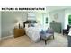 Cozy bedroom with plush bedding and plenty of natural light at 189 Calvin Creek Dr, Troutman, NC 28166