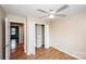 Bright bedroom with wood floors and built-in shelving at 3001 Austin Chaney Rd, Monroe, NC 28110