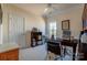 Bright home office features built-in shelving and large window at 5981 Bison Ct, Fort Mill, SC 29707