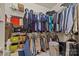 Well-organized closet with shelving and hanging rods at 599 Georgetown Nw Dr, Concord, NC 28027