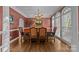 Formal dining room with hardwood floors and large windows at 599 Georgetown Nw Dr, Concord, NC 28027