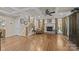 Spacious living room features hardwood floors, fireplace, and high ceilings at 599 Georgetown Nw Dr, Concord, NC 28027