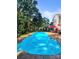 Sparkling blue swimming pool in backyard at 6638 Kingbird Ct, Charlotte, NC 28215