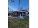 Brick ranch house with a covered porch and landscaped yard at 111 Dye St, Chester, SC 29706