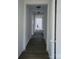 Long hallway with light walls and doors to other rooms at 111 Dye St, Chester, SC 29706