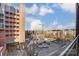 Balcony view of city street, parking lot, and construction at 300 W 5Th St # 339, Charlotte, NC 28202