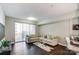 Spacious living room with hardwood floors and large windows at 300 W 5Th St # 339, Charlotte, NC 28202