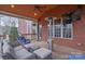 Relaxing covered porch with seating area and heater at 3204 Bannock Dr, Fort Mill, SC 29715