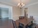 Formal dining room features hardwood floors and chandelier at 3204 Bannock Dr, Fort Mill, SC 29715