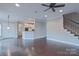 Spacious living room with hardwood floors and kitchen views at 3204 Bannock Dr, Fort Mill, SC 29715