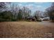 Large backyard with gravel area and storage shed at 333 W Wilson Ave, Mooresville, NC 28115