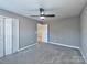 Spacious bedroom with double door closet and carpet at 3380 Merchant Ln, Davidson, NC 28036