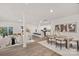 Open concept dining room with kitchen, breakfast bar, and hardwood floors at 380 Bly St, Rock Hill, SC 29732